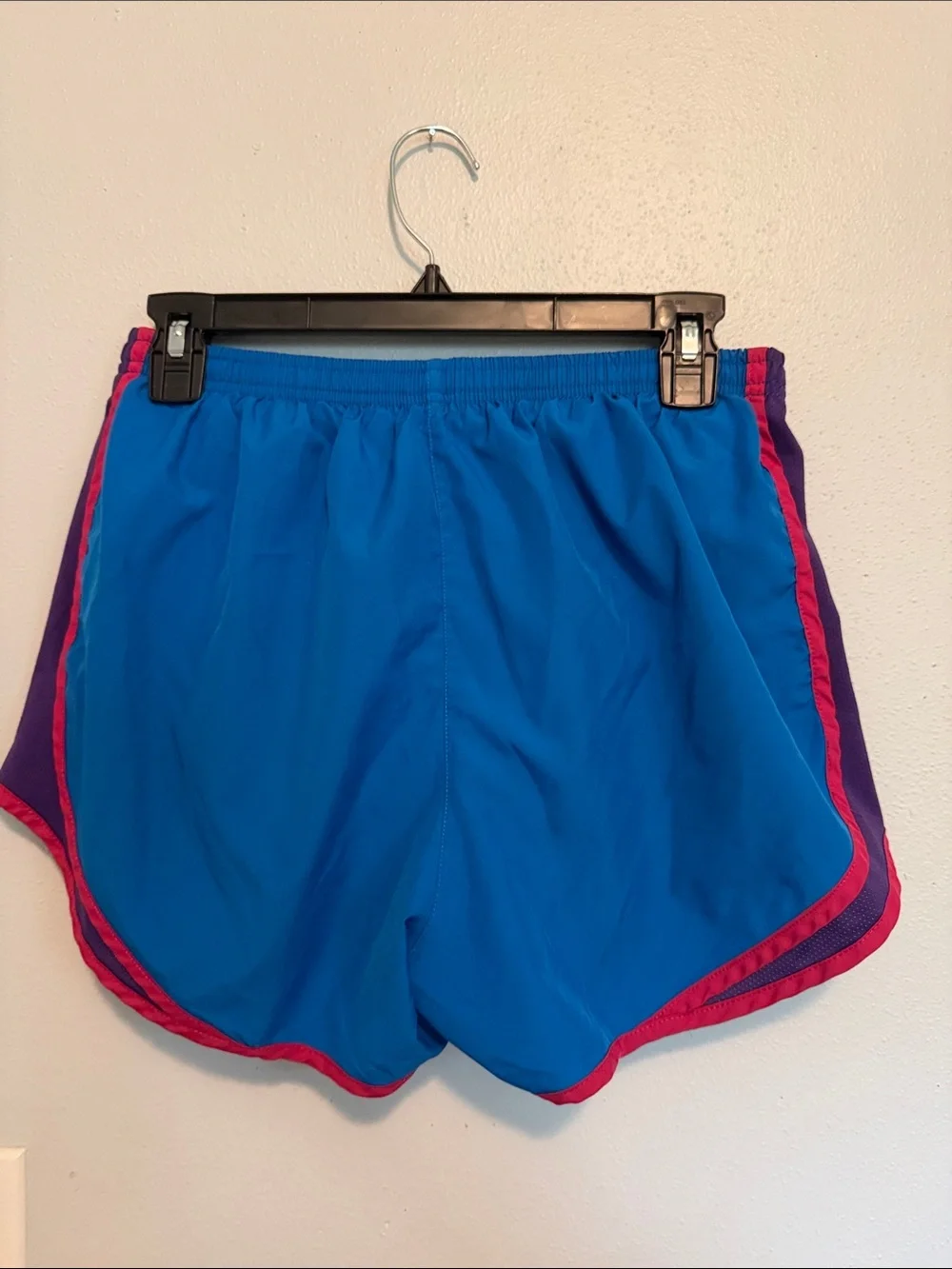 Nike Women's Bright Blue Athletic Shorts with Pink and Purple Accents